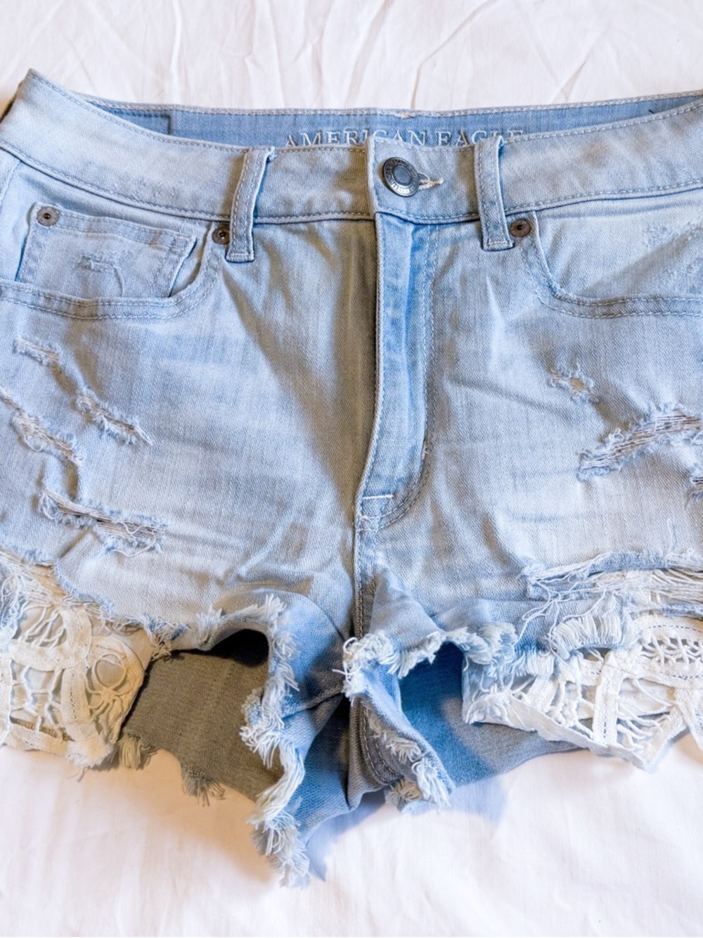 American Eagle Outfitters Light Wash Distressed Denim Lace-Trim Shorts